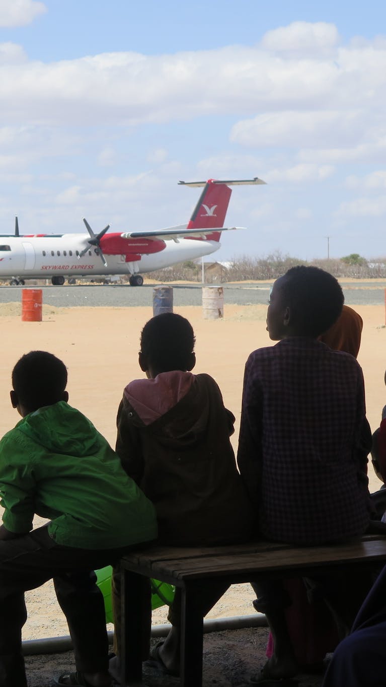 Somalische vluchtelingen in Dadaab wachten op vliegtuig naar Somalië