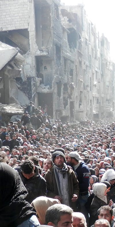 Vluchtelingen in al-Yarmouk, een vluchtelingenkamp ten zuiden van de Syrische hoofdstad Damascus (2014)