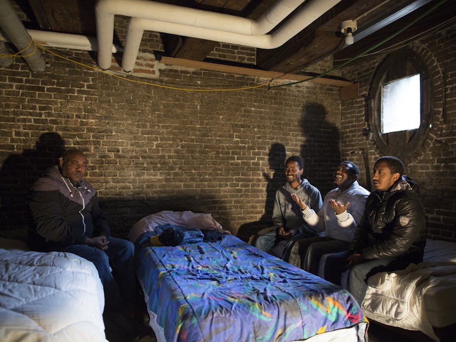 Uitgeprocedeerde asielzoekers van de groep ‘We are here’ verblijven in oktober 2015 in de kelder van het Wereldhuis in Amsterdam.