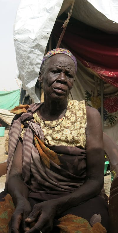 Een gevluchtte Shilluk vrouw uit Zuid-Sudan in Malakal vluchtelingenkamp