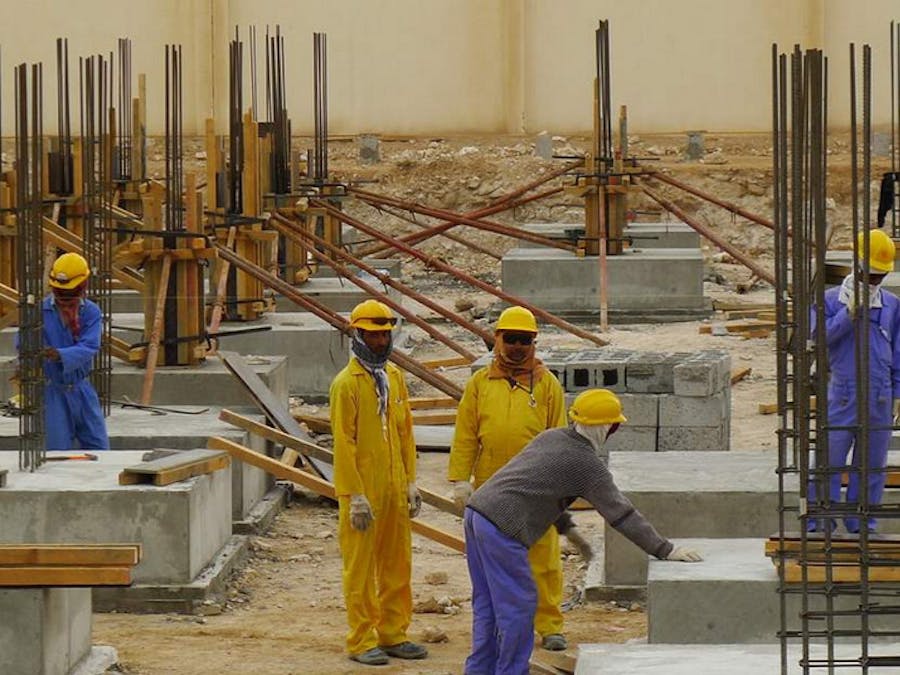 Arbeidsmigranten aan het werk in Qatar.