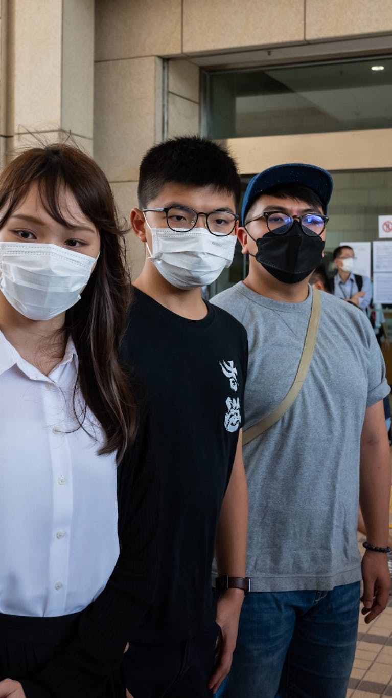 Joshua Wong, Agnes Chow en Ivan Lam zijn veroordeeld tot gevangenisstraffen voor betrokkenheid bij een demonstratie in Hongkong in 2019