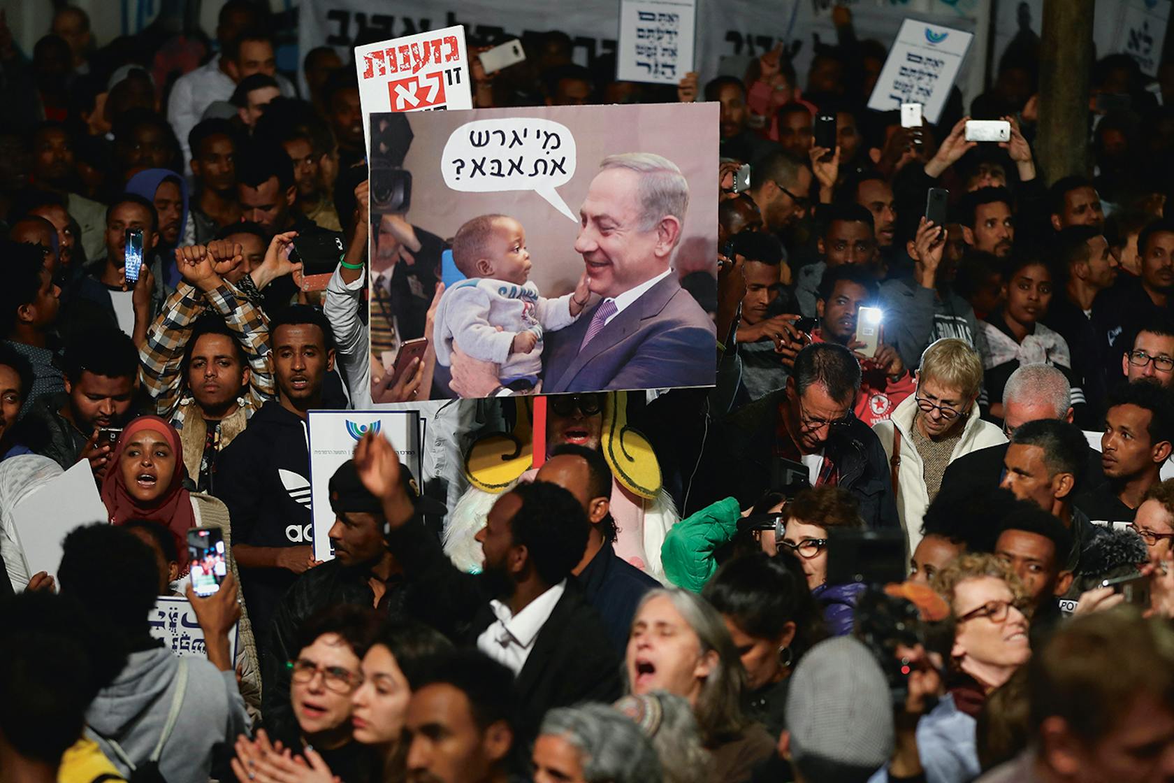 ‘Wie zal jouw papa eens gaan deporteren?’ Demonstratie in Tel Aviv begin 2018 tegen het beleid van de Israëlische regering om Afrikaanse asielzoekers uit te zetten naar Rwanda.
