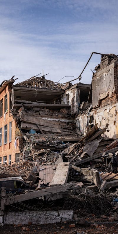 This photograph taken on March 4, 2022 shows a school building damaged in yesterday's shelling in the city of Chernihiv. - Fourty-seven people died on March 3 when Russian forces hit residential areas, including schools and a high-rise apartment building, in the northern Ukrainian city of Chernihiv, officials said. (Photo by Dimitar DILKOFF / AFP) (Photo by DIMITAR DILKOFF/AFP via Getty Images)