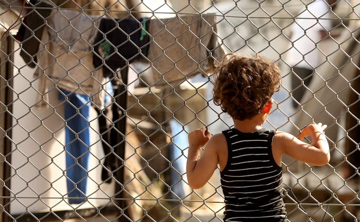 Een kind in vluchtelingenkamp Moria op het Griekse eiland Lesbos (2018).