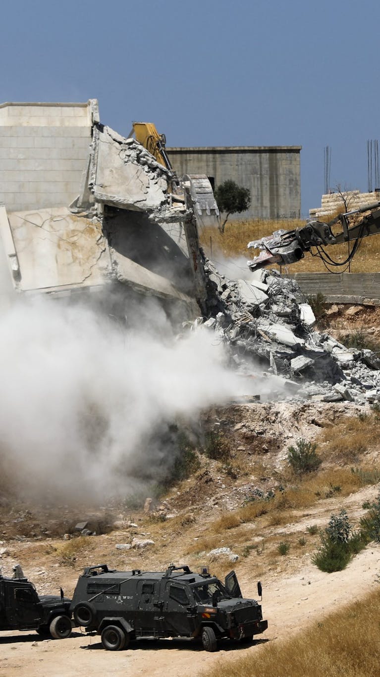 Vernietiging van Palestijns gebouw door Israëlische veiligheidsdienst in Dar Salah, West Bank. Juli 2019